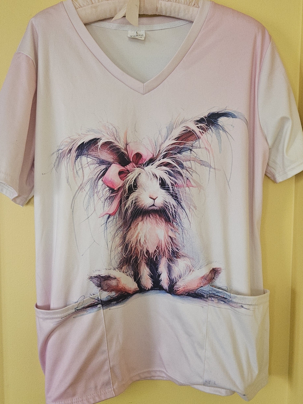 Playful Bunny Graphic V-Neck Scrub Top in Pink and White